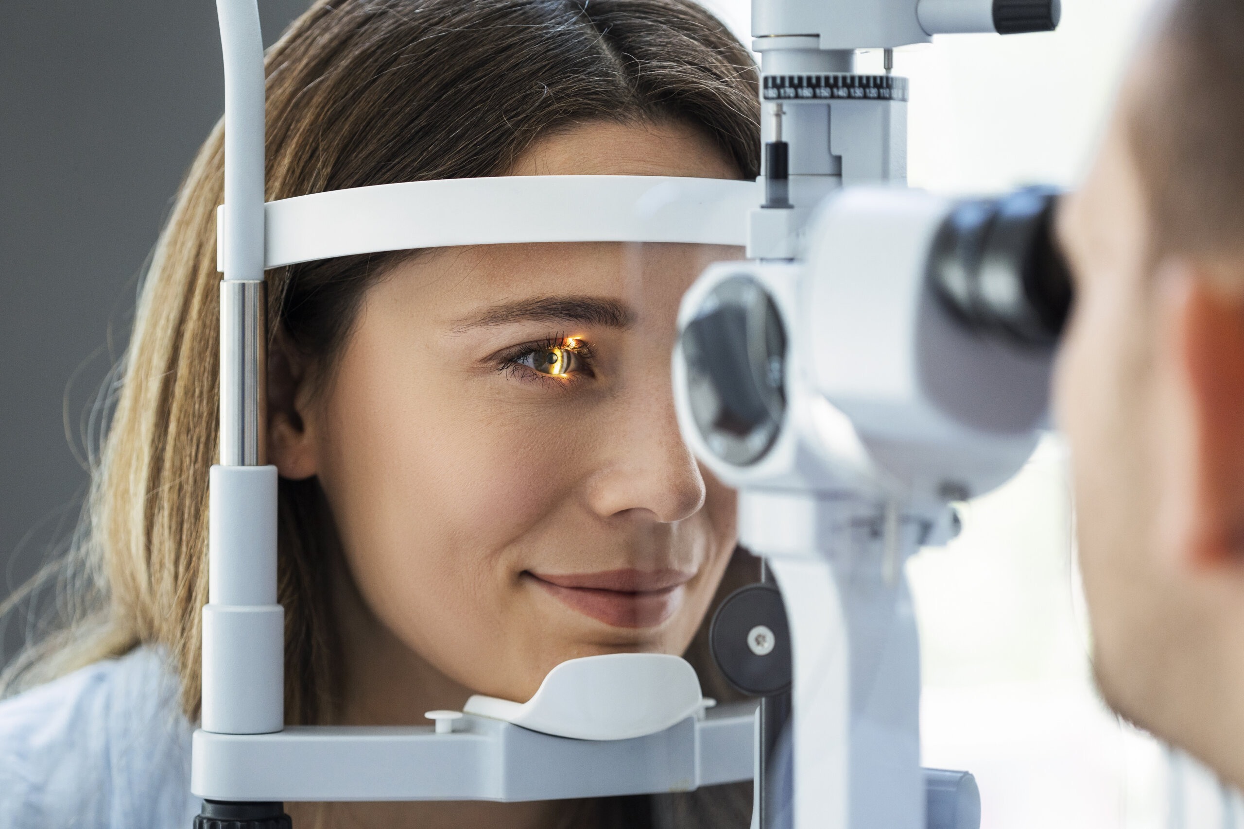 Woman receiving eye exam