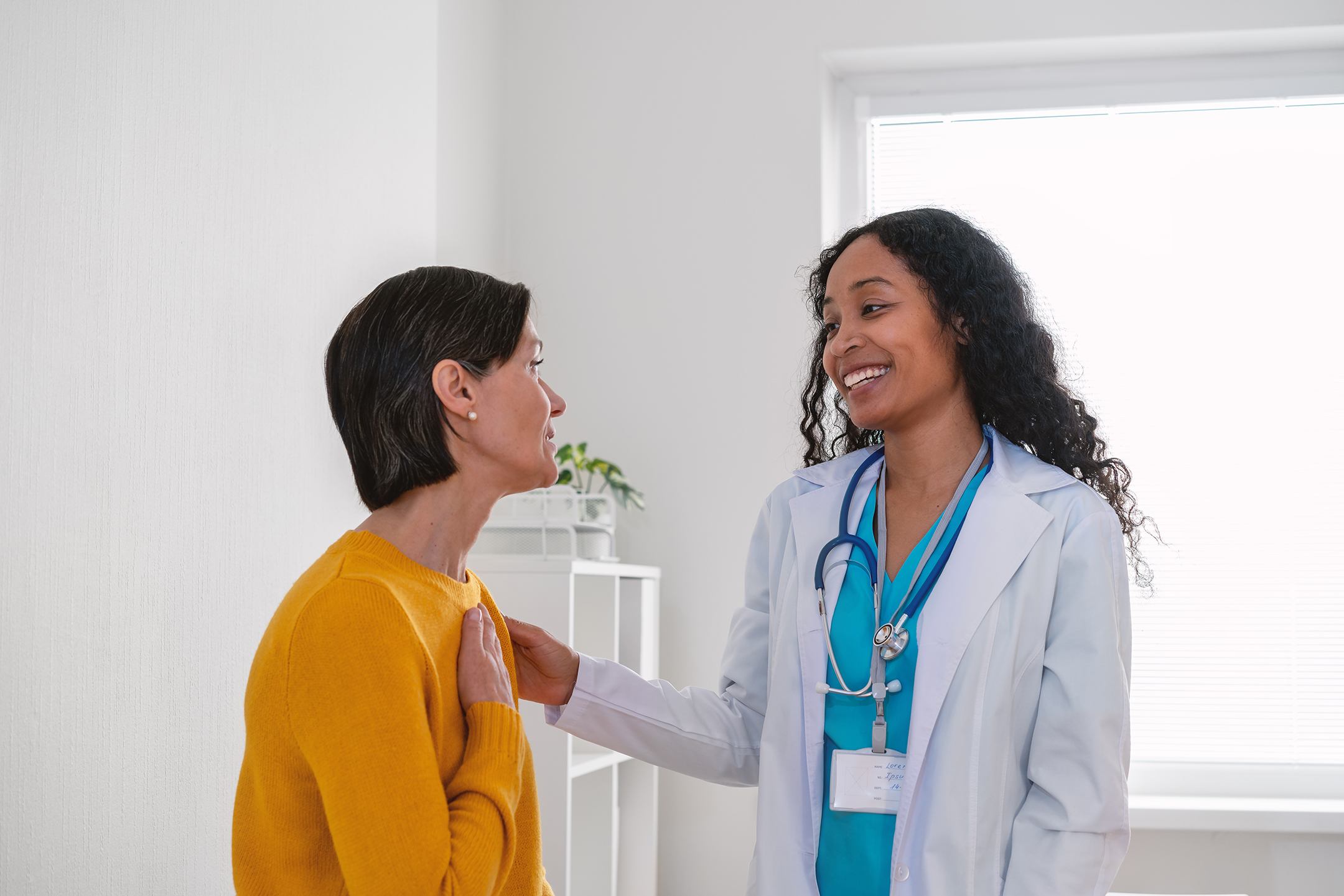 Doctor speaks to patient about clinical trials