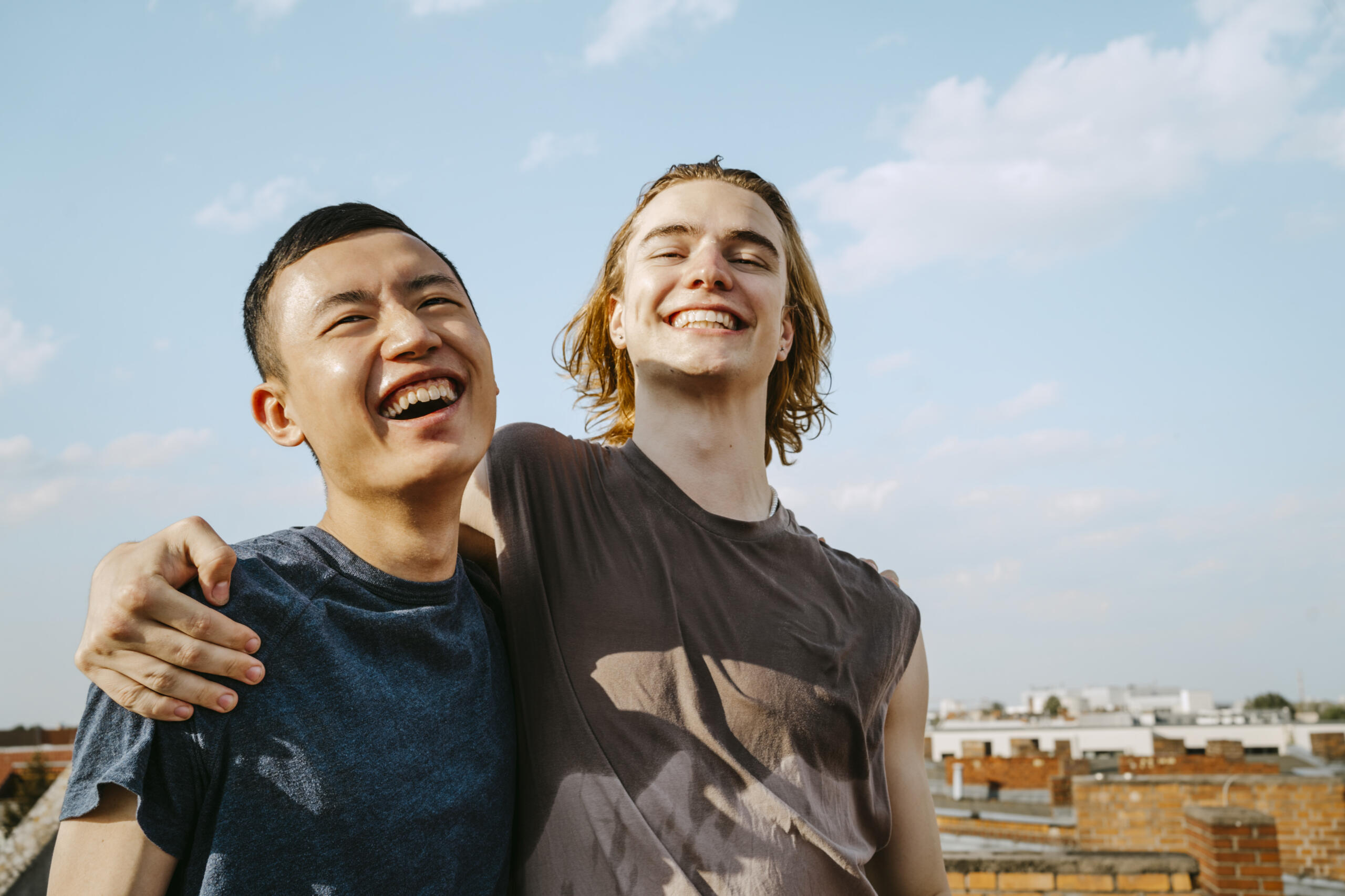 Cheerful young male friends hang out