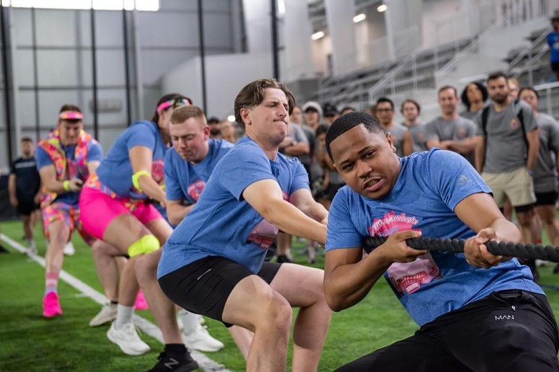 Teams competing in tug-of-war at the Real Estate Games